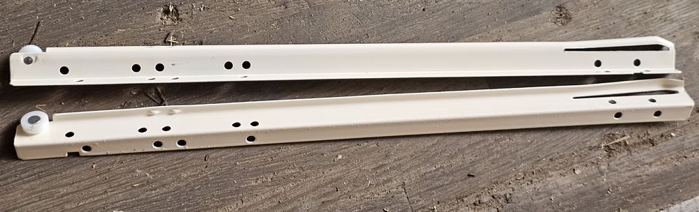 Approx 10 tons (9900 pairs) of 20" Roller Slides - Houch Industries